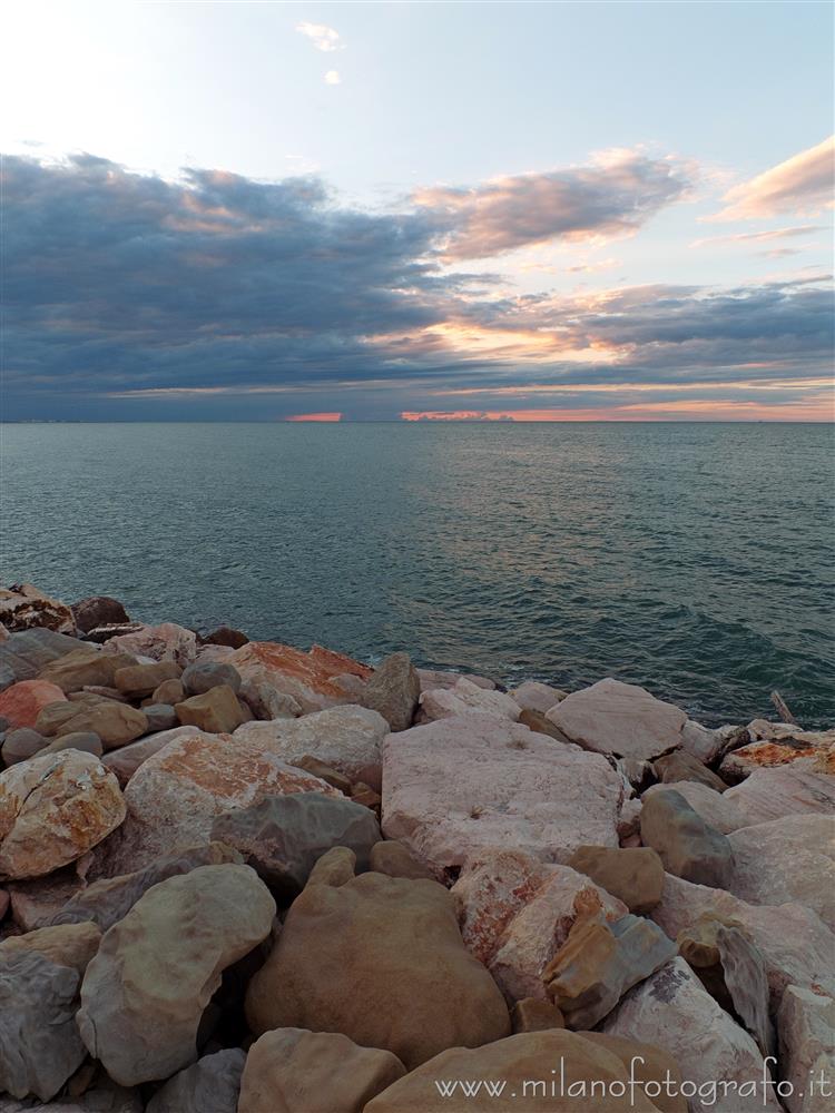 Cattolica (Rimini, Italy) - Breakwater rocks at sunset